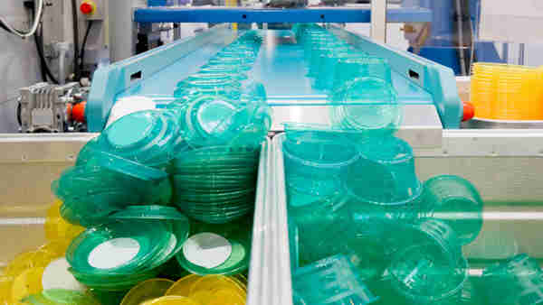 Mass Production Of green and yellow Plastic Lids And Containers